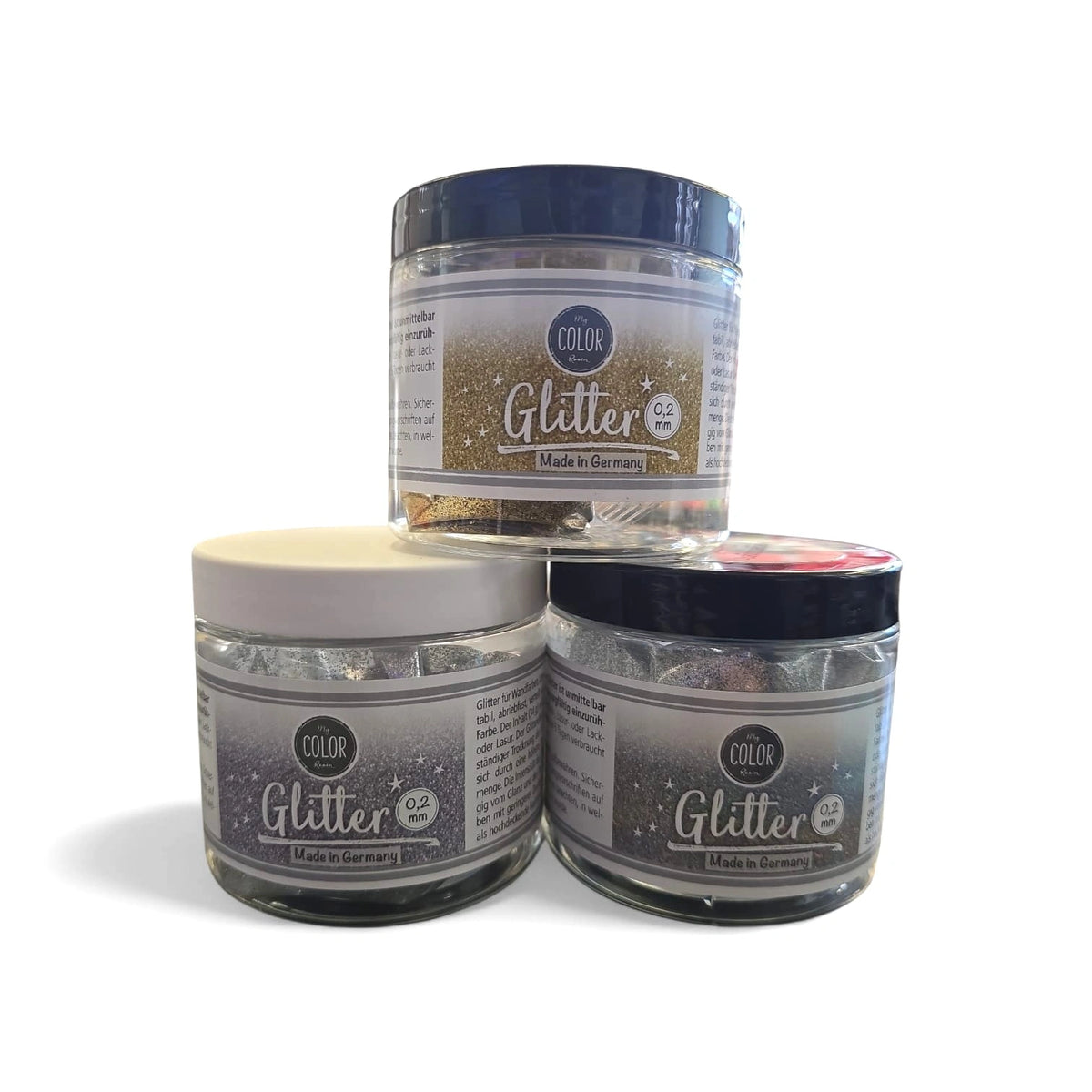 Decoratieve glitters voor muurverf in goud, zilver en regenboogkleuren.