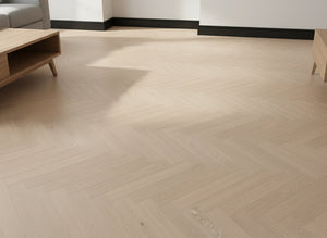 OTIUM Allure Herringbone Dryback visgraat PVC in lichtgrijs eik met realistische houtnerf.